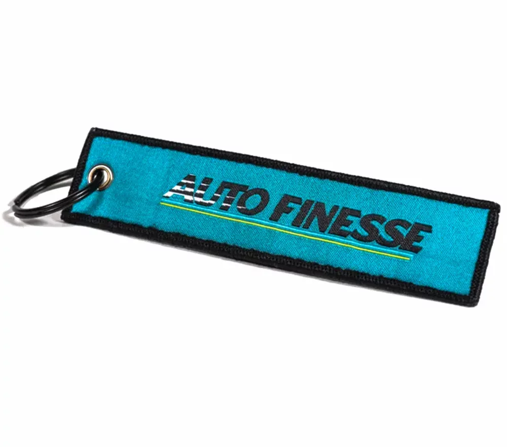 Přívěsek na klíče Auto Finesse Retro Race Tag - tyrkysový
